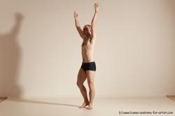 Underwear Gymnastic poses Man White Slim Bald Dancing Dynamic poses Academic