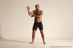 Underwear Man Black Muscular Bald Dancing Dynamic poses Academic