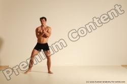 Underwear Fighting Man White Athletic Short Brown Dynamic poses Academic