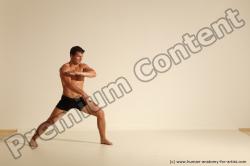 Underwear Fighting Man White Athletic Short Brown Dynamic poses Academic