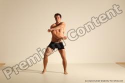 Underwear Fighting Man White Athletic Short Brown Dynamic poses Academic