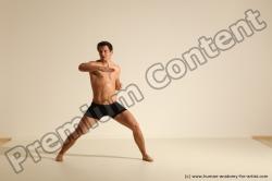 Underwear Fighting Man White Athletic Short Brown Dynamic poses Academic