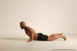 Underwear Man Black Muscular Bald Dancing Dynamic poses Academic