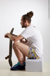 Sportswear Man White Sitting poses - simple Slim Brown Sitting poses - ALL Dreadlocks Standard Photoshoot Academic