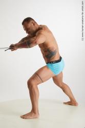 Underwear Fighting with sword Man White Muscular Short Brown Standard Photoshoot Academic