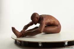 Nude Man Black Sitting poses - simple Slim Bald Sitting poses - ALL Standard Photoshoot Realistic