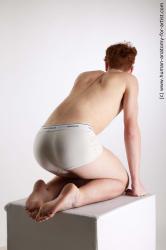 Underwear Man White Kneeling poses - ALL Athletic Short Red Kneeling poses - on both knees Standard Photoshoot Academic