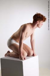 Underwear Man White Kneeling poses - ALL Athletic Short Red Kneeling poses - on both knees Standard Photoshoot Academic