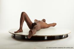 Nude Man Black Laying poses - ALL Athletic Bald Laying poses - on back Standard Photoshoot Realistic