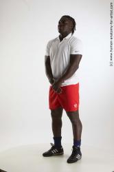 Sportswear Man Black Standing poses - ALL Muscular Black Standing poses - simple Dreadlocks Standard Photoshoot Academic