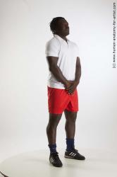 Sportswear Man Black Standing poses - ALL Muscular Black Standing poses - simple Dreadlocks Standard Photoshoot Academic