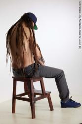 Casual Man White Sitting poses - simple Slim Brown Sitting poses - ALL Dreadlocks Standard Photoshoot Academic