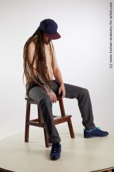 Casual Man White Sitting poses - simple Slim Brown Sitting poses - ALL Dreadlocks Standard Photoshoot Academic